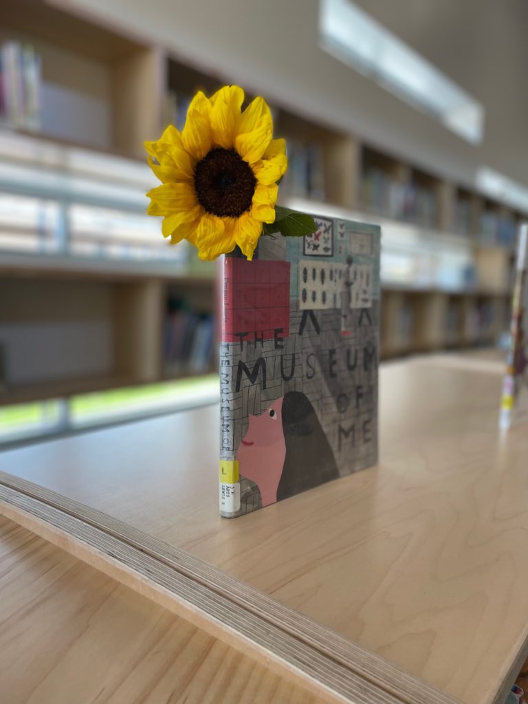 A sunflower in a library book